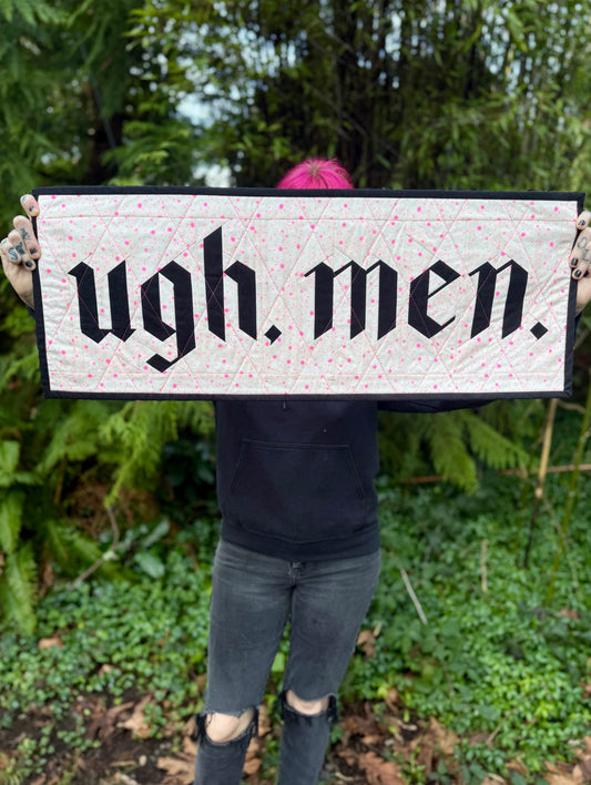 Ugh, men.  Quilted wall hanging