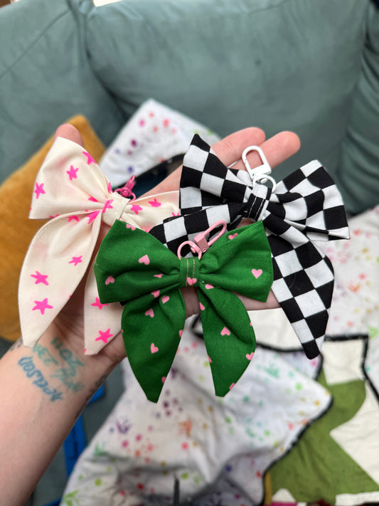 Three bow keychains
